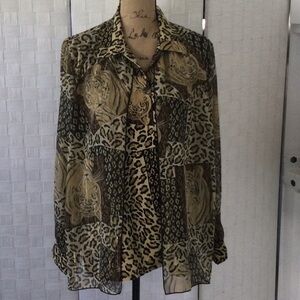 Woman’s Tiger Print Blouse size L color tan and black looks like 2 pc but is 1
